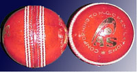 [Graphic: The cricket ball with seam]